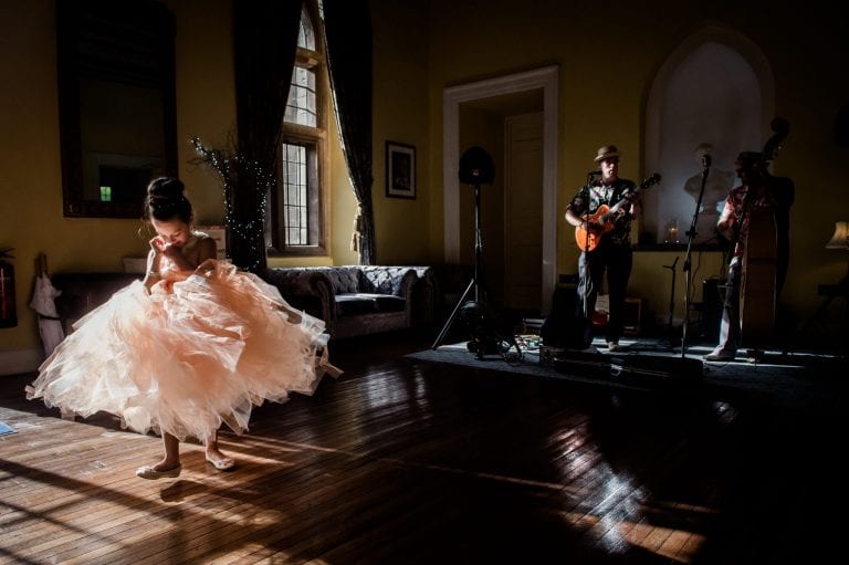 Bridesmaid dancing at Clearwell Castle wedding