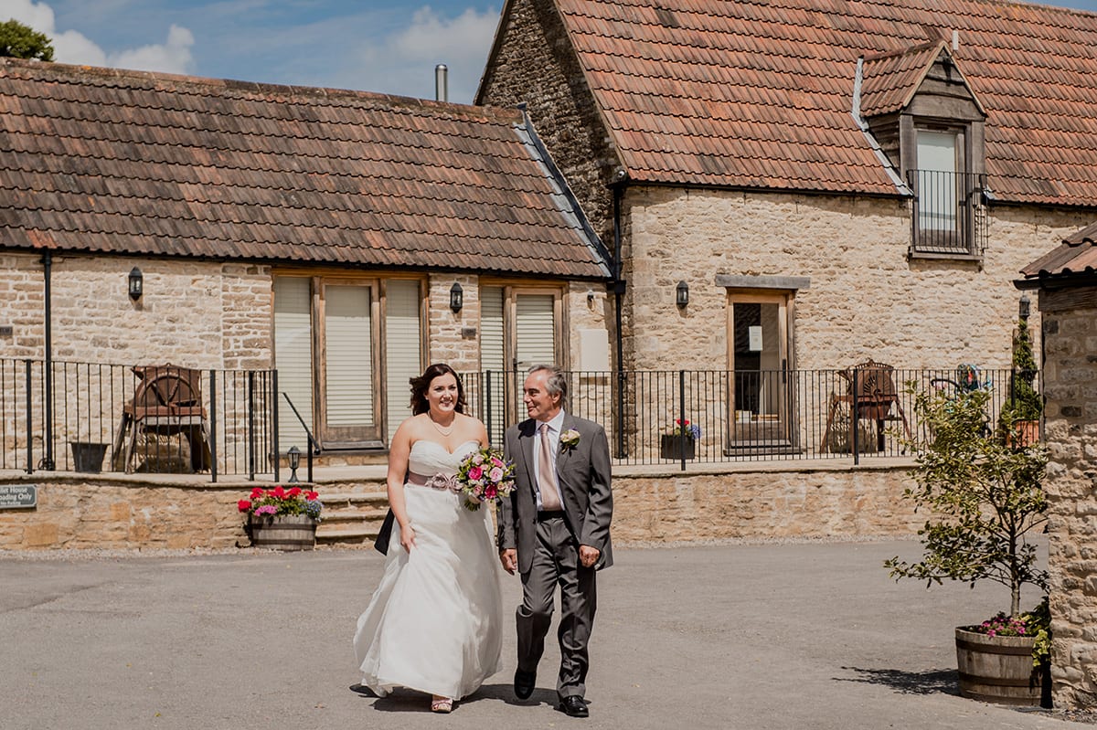 The pretty courtyard walk at Kingscote Barn
